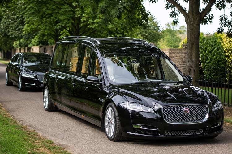 Jaguar hearse and funeral limousine cars in Swanley, arranged for respectful funeral transport.